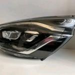 Ford Transit Custom or Ford Tourneo Custom headlight from model years 2018-2024.