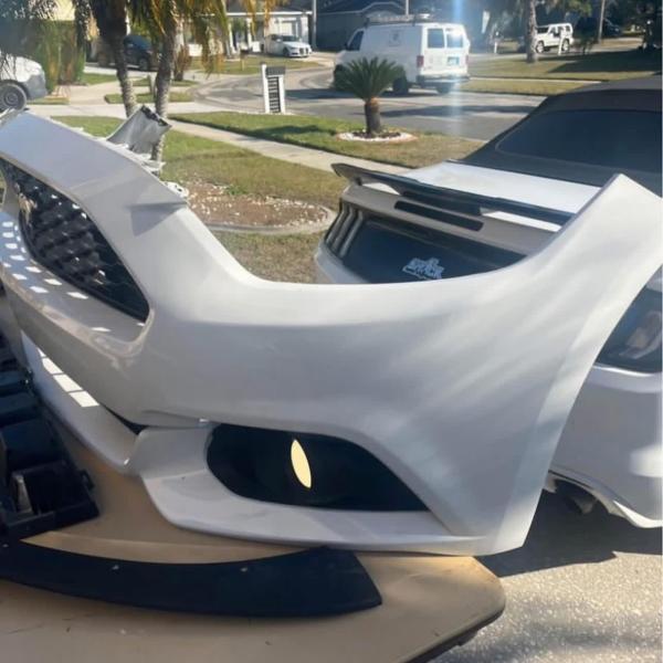 2015-2017 Ford Mustang v6 OEM Front Bumper, Fog Lights, and MP Concepts emblem.