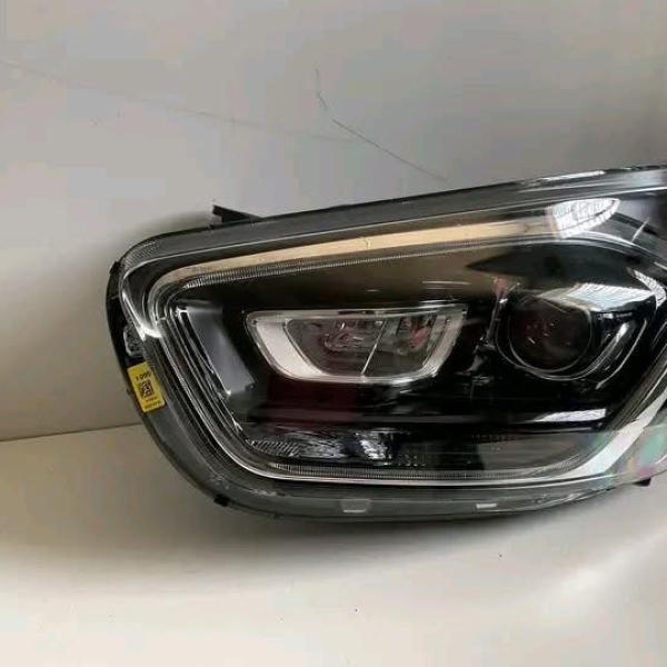 Ford Transit Custom or Ford Tourneo Custom headlight from model years 2018-2024.